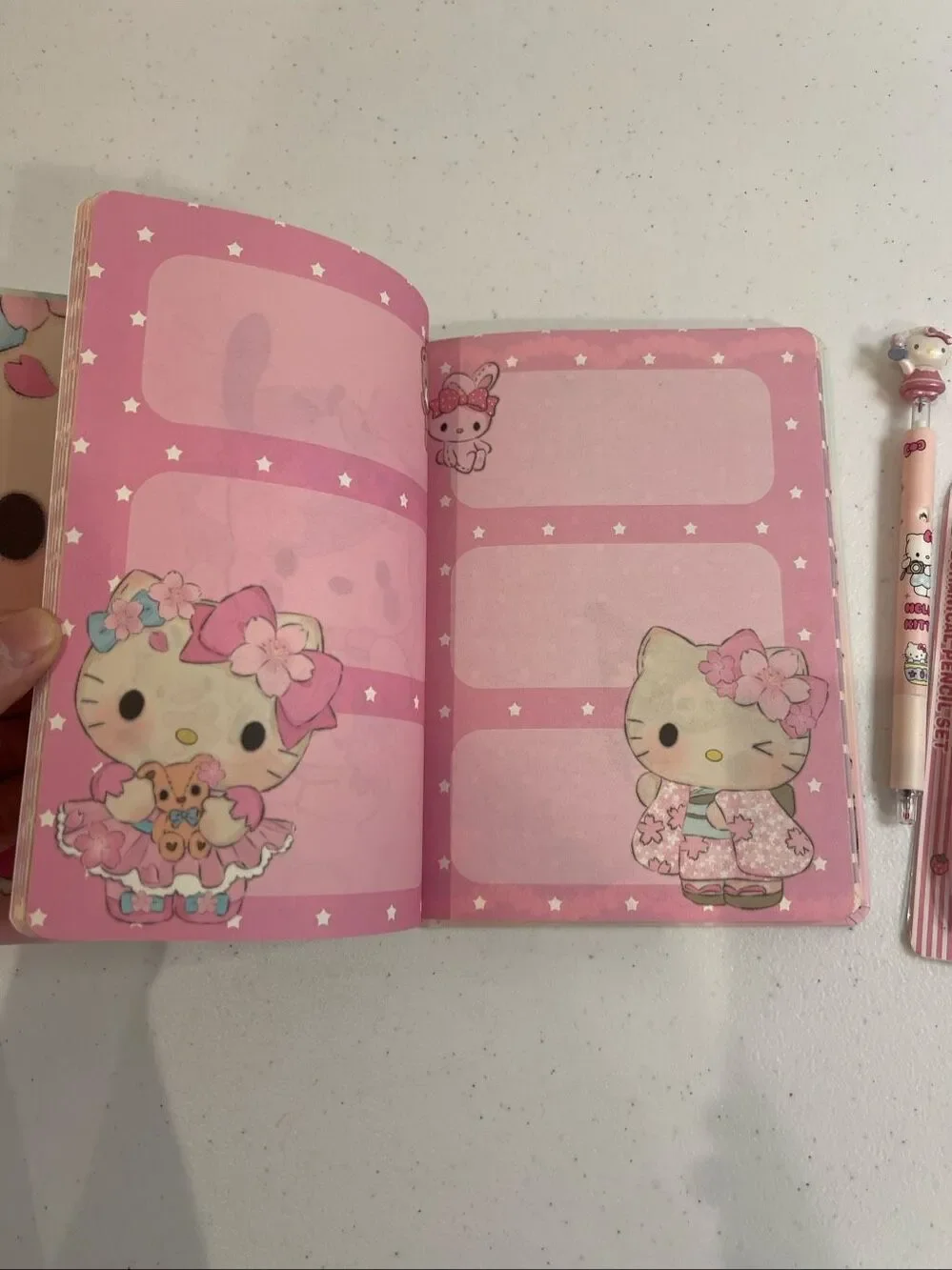 Hello Kitty hard cover journal decorative pages pen and pencil included